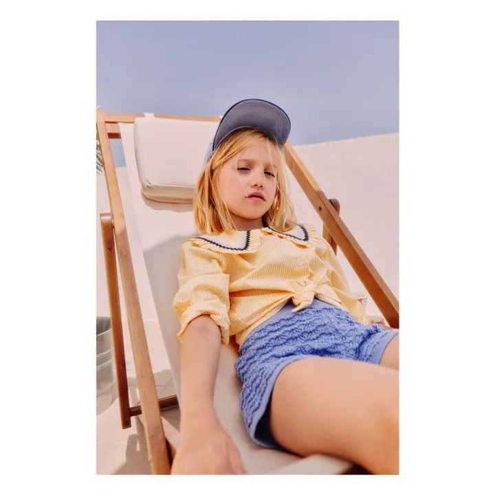 Child styled in Smallable